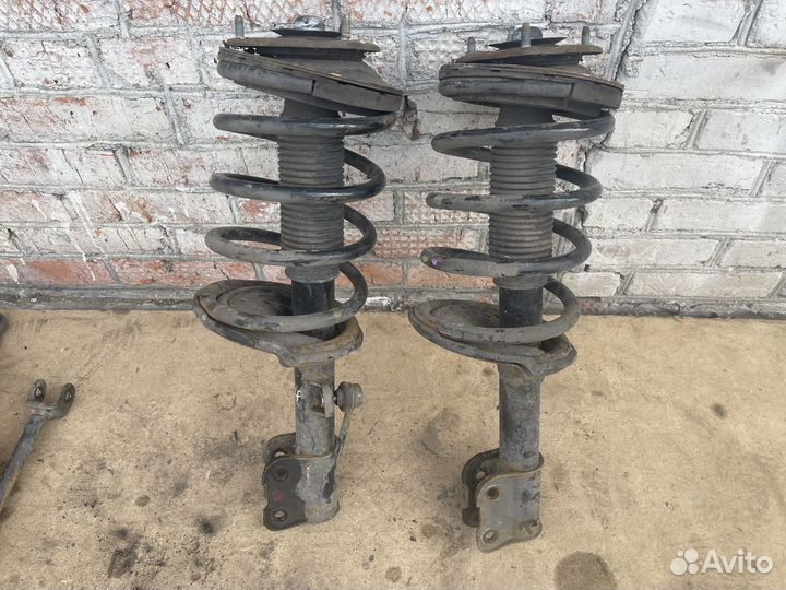 Стойка передняя Hyundai Santa Fe 2 (CM)