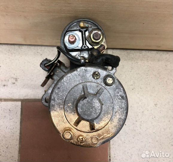 Стартер Nissan Almera N16 JS1100