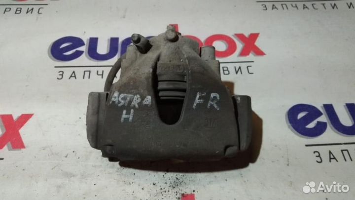 Суппорт передний правый Opel Astra H / Family 200