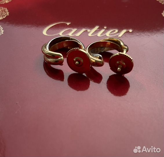 Золотые серьги Cartier Trinity