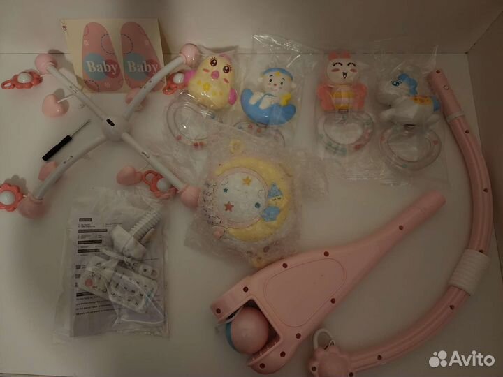 Мобиль в кроватку новый