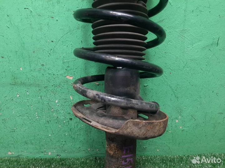 Стойка амортизатора передняя левая Honda Civic 4D