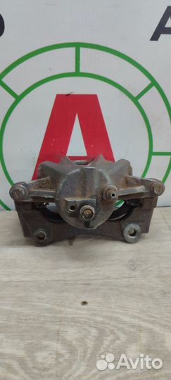 Суппорт тормозной передний правый Toyota Avensis