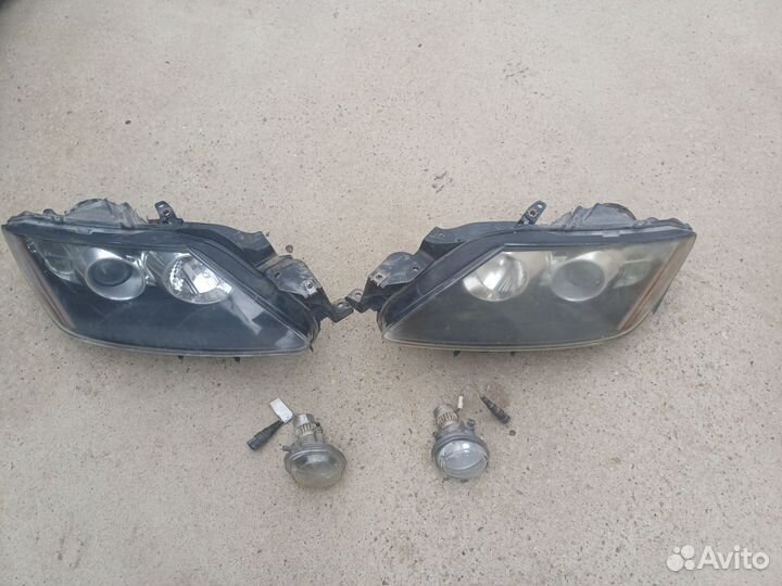 Передние фары на мазда сх7 2010г