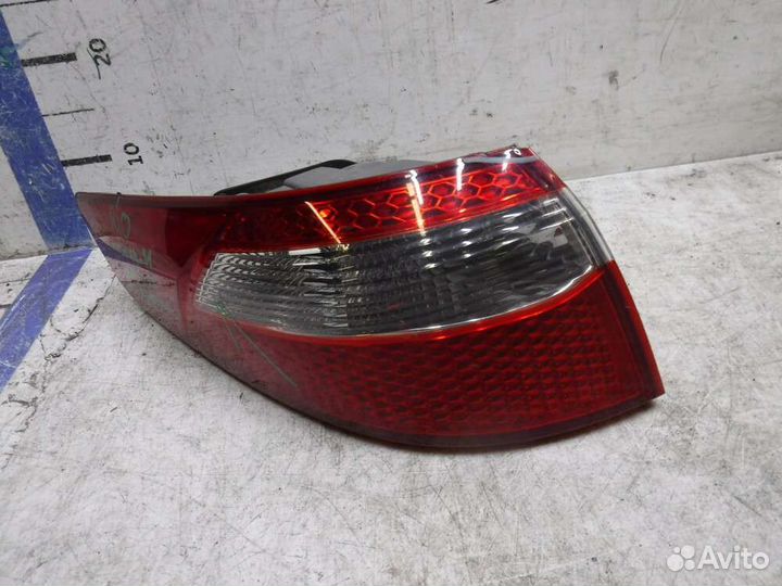 Фонарь левый Киа рио 2013г