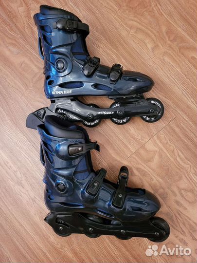 Роликовые коньки