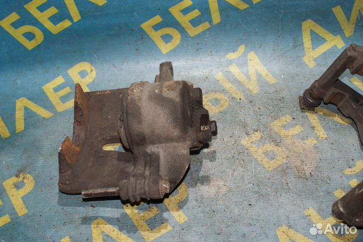 Суппорт передний + скоба Chrysler Voyager 4