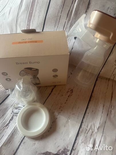 Молокоотсос электрический новый