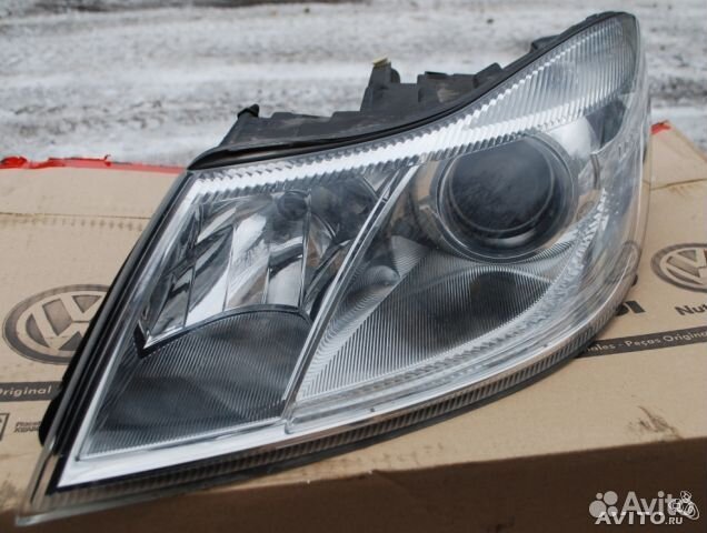 Фара левая Оригинальная на Octavia A5 Рест наличии