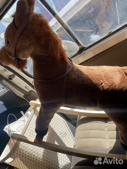 Конь качалка