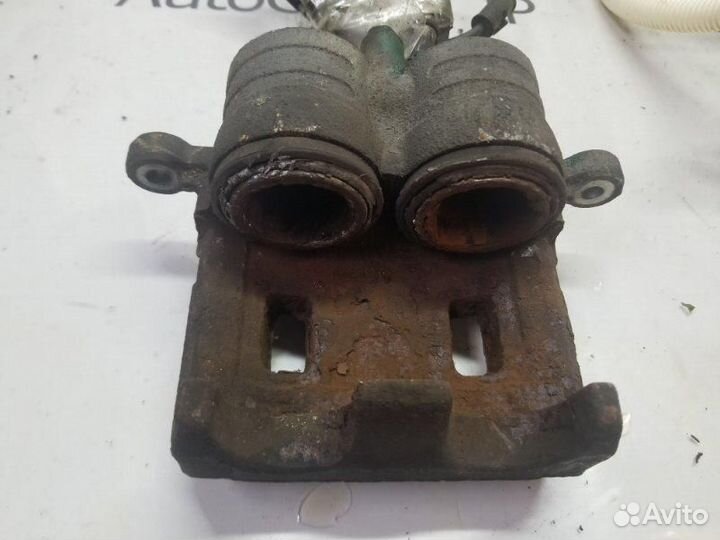 Суппорт передний левый Subaru Forester