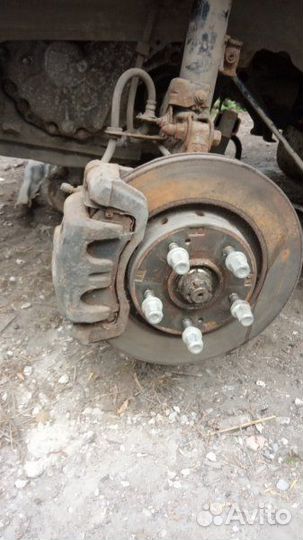 Суппорт передний левый Mitsubishi Outlander Xl 2