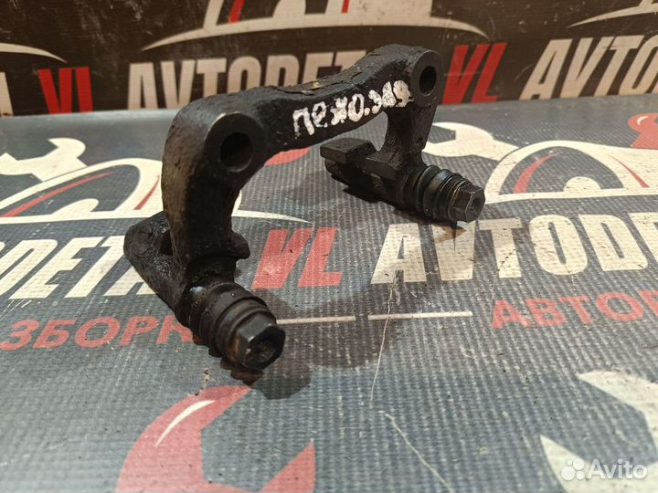 Скоба суппорта заднего Peugeot 307