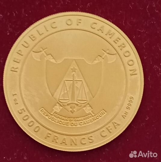 Золотая монета шахматы