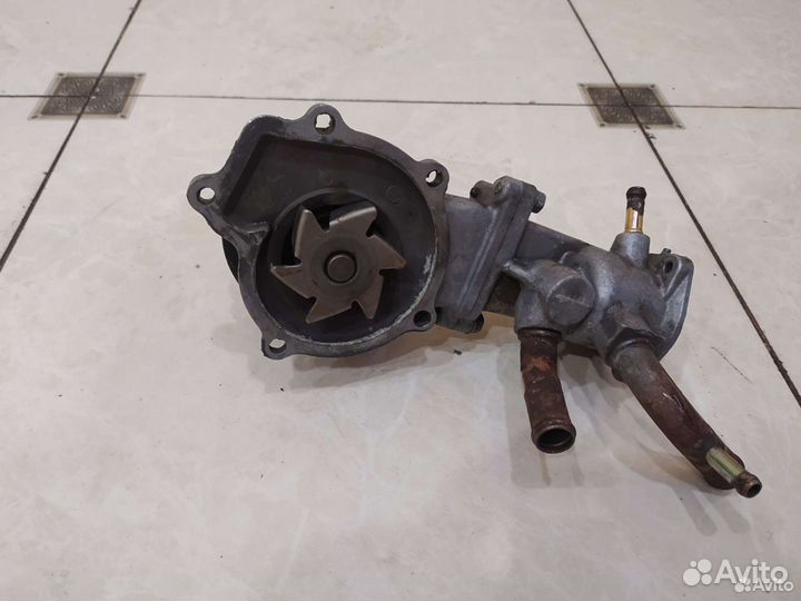Помпа Nissan Almera N15