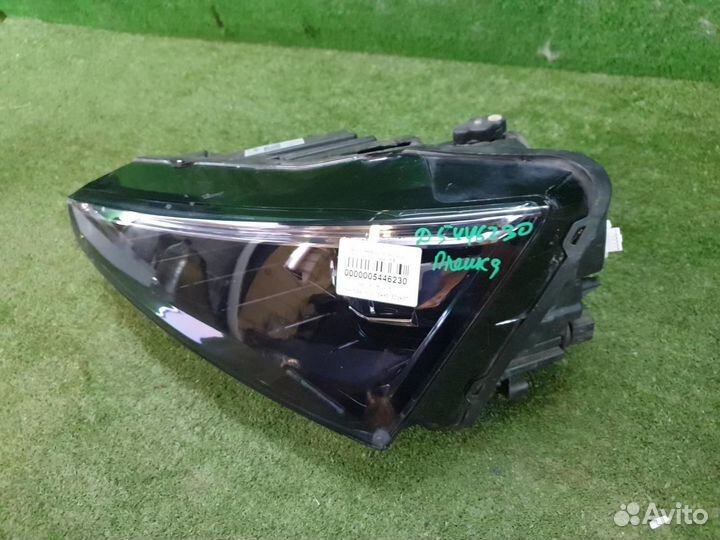 Фара левая Skoda Rapid