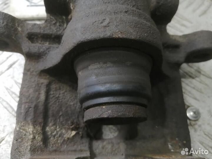 Суппорт задний правый Mitsubishi Lancer X