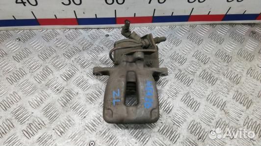 Суппорт тормозной задний левый volkswagen passat B