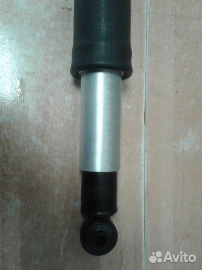 Пневмостойка Cadillac Escalade задняя правя\левая