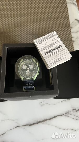 Часы swatch omega earth