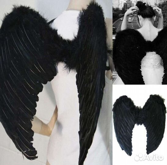 Большие черные крылья ангела