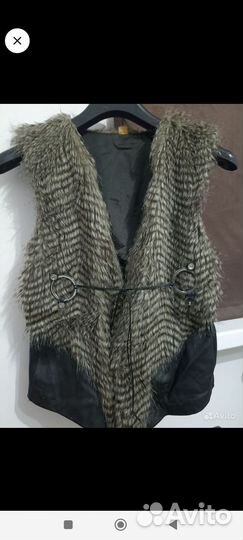 Жилеты теплые женские