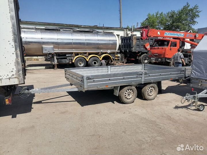 Прицеп двухосный с размером кузова 3,6 на 2,1м