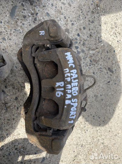 Суппорт тормозной pajero sport 1