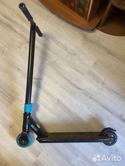 Трюковой самокат re action