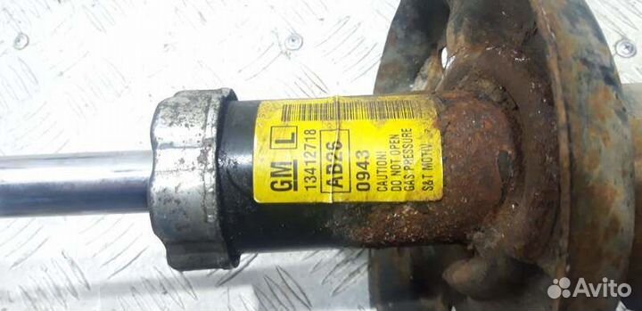 Амортизатор передний левый Chevrolet Cruze J300