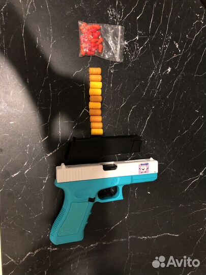 Пистолет игрушечный с гильзами
