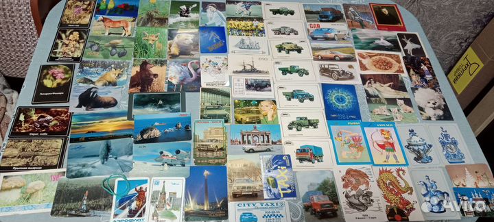 Карманные календарики разные много