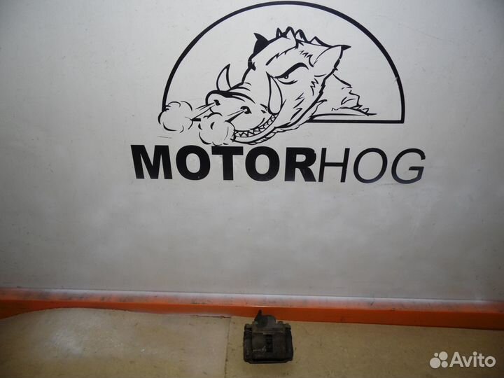 Суппорт тормозной передний левый Рено Логан