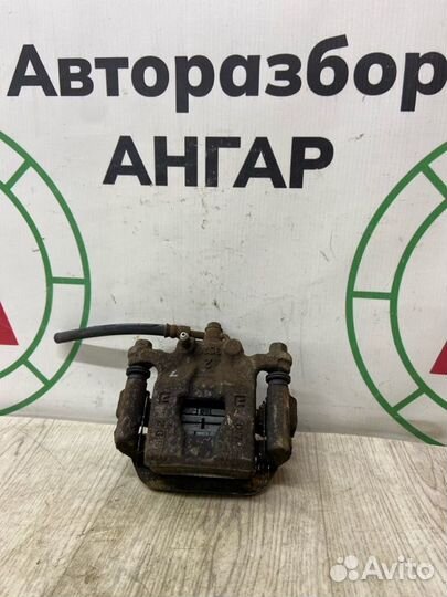 Суппорт тормозной задний левый Nissan Juke F15