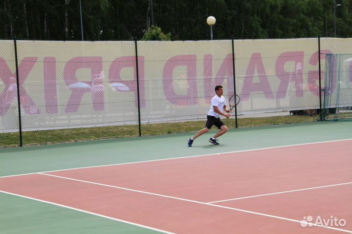 Тренер по большому теннису