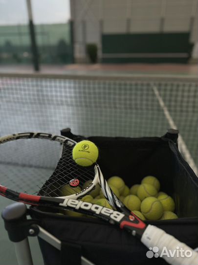 Тренер по большому теннису