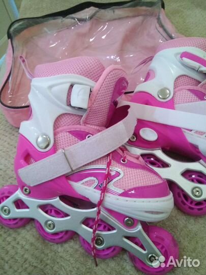 Роликовые коньки