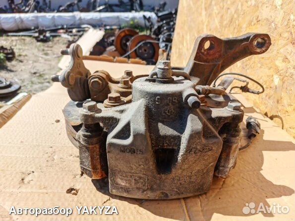 Кулак Киа Спортейдж 4 левый поворотный