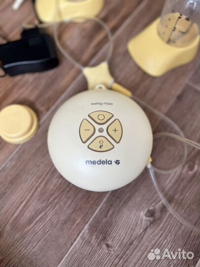 Молокоотсос medela электрический