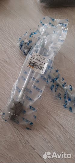 Тяга рулевая и пыльник рулевой рейки Nissan AD