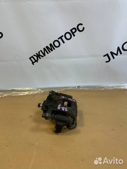 Суппорт тормозной задний левый nissan qashqai J10