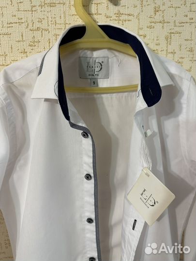 Новая школьная рубашка для мальчика