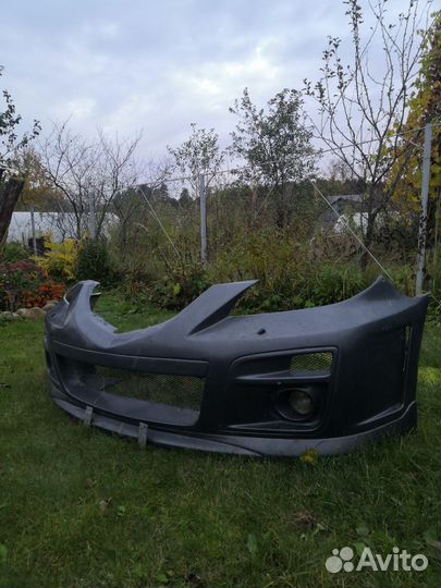 Бампер передний Мазда 3 бк седан