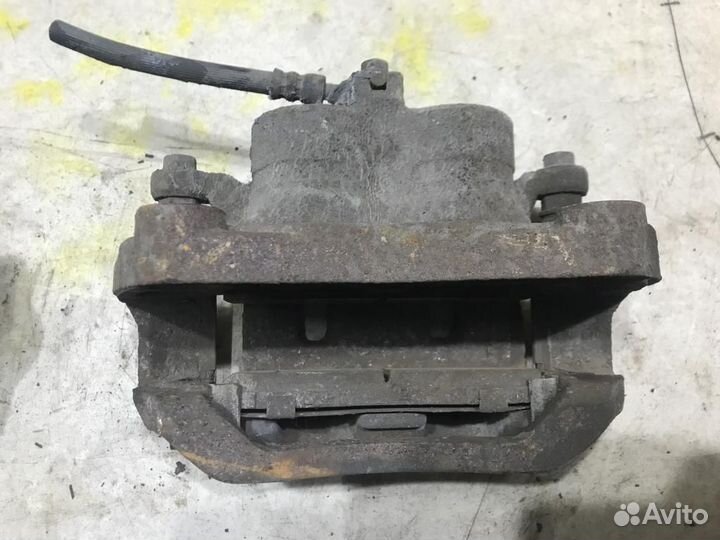 44011JY00A Суппорт левый Nissan Qashqai +2