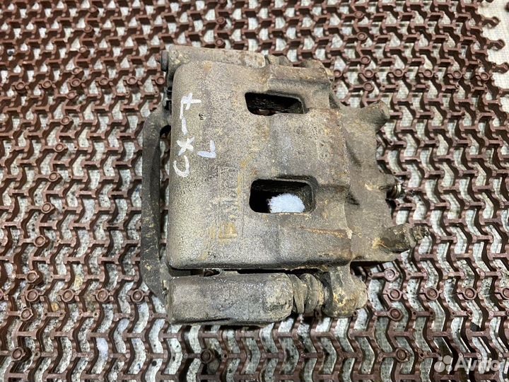 Суппорт передний левый сх-7 Mazda CX-7