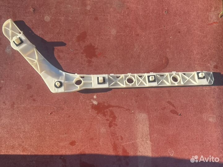 Кронштейн бампера заднего Nissan Almera G15