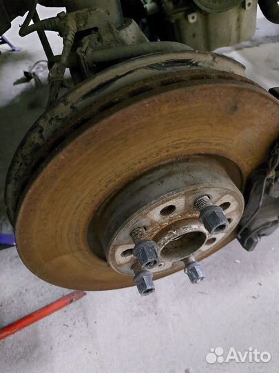 Диск тормозной передний для VW Пассат Б6