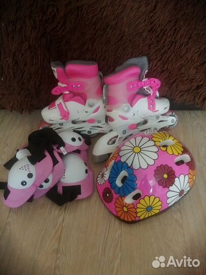 Роликовые коньки