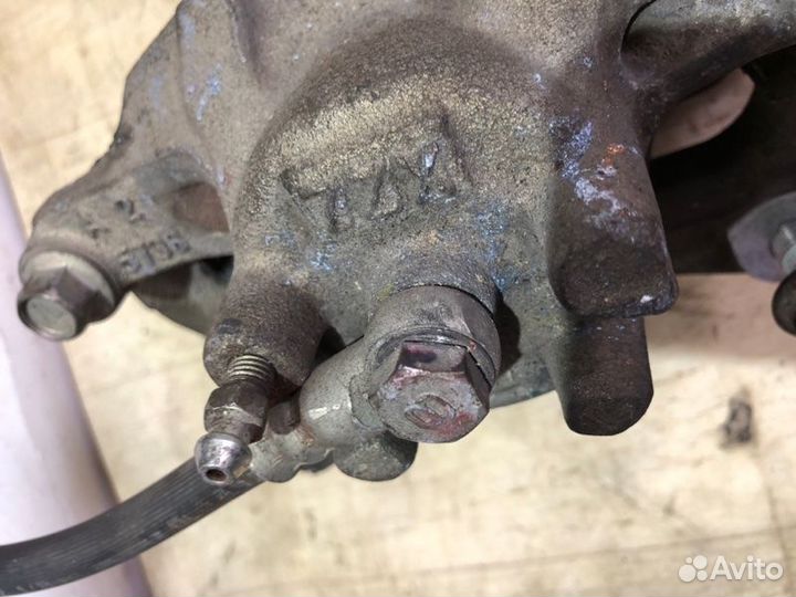 Суппорт передний левый Mitsubishi Lancer 10 CY3A