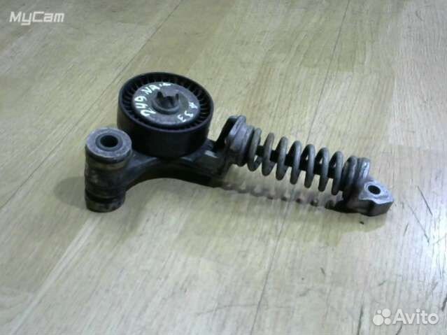 Натяжитель ремня генератора Opel Astra G